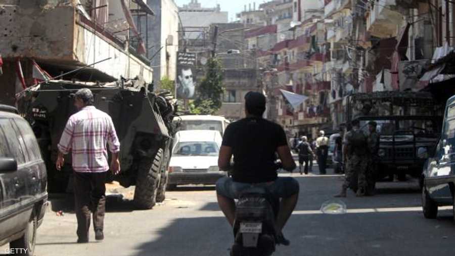 جنود لبنانيون ينتشرون في حي جبل محسن، ذي الأغلبية العلوية في مايو 2012، حيث وقعت اشتباكات بين الجانبين