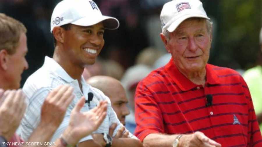 بوش الأب مع تايغر وودز