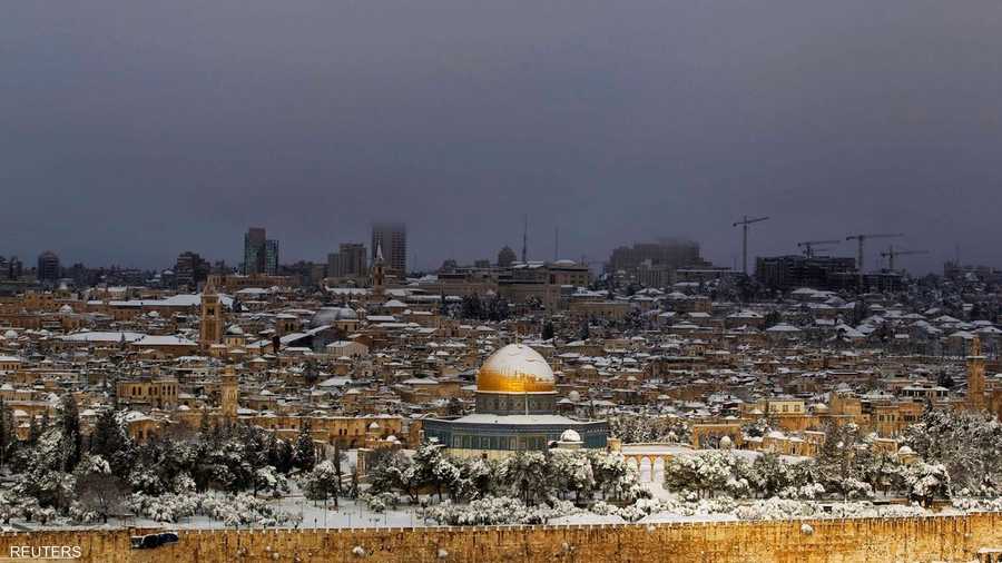 الأجواء الباردة والثلوج تغطي القدس القديمة