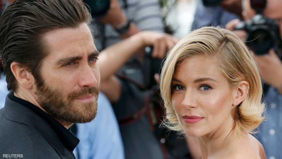 الممثل الأميركي جيك جيلنهال والممثلة البريطانية سينا ميلر قبيل افتتتاح مهرحان كان