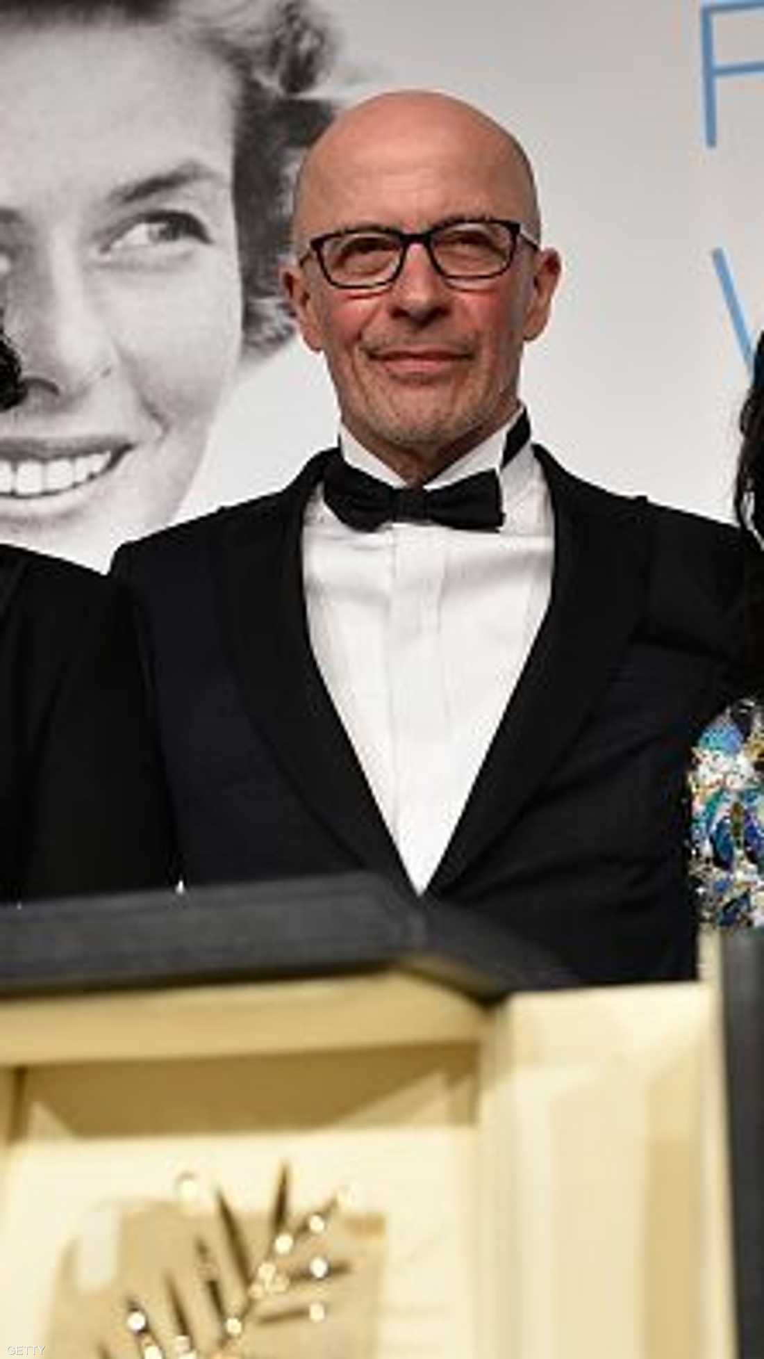 المخرج الفرنسي جاك أوديارد مع أبطال فيلمه الفائز بالسعفة الذهبية