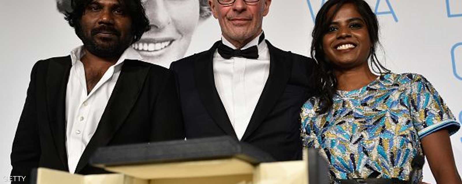 المخرج الفرنسي جاك أوديارد مع أبطال فيلمه الفائز بالسعفة الذهبية