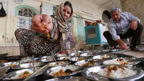 أكراد يجهزون وجبات إفطار مجانية لضيوفهم النازحين واللاجئين من العراق وسوريا