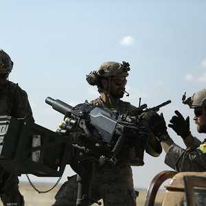 جنود أميركيون ارتدوا شارات سوريا الديمقراطية (أرشيف)