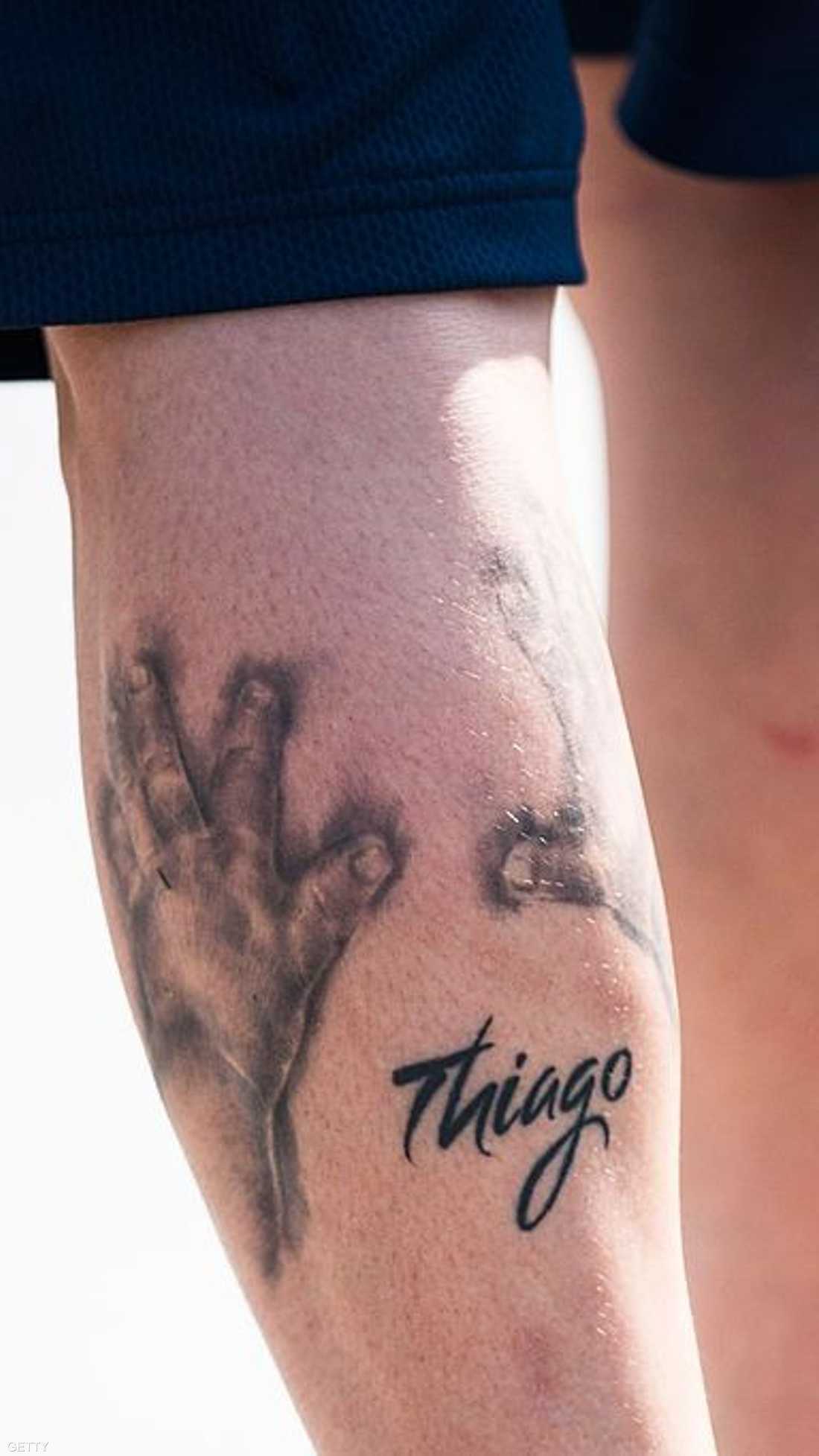 ميسي وشم اسم ابنه تياغو