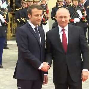 ماكرون وبوتن في لقاء سابق