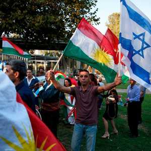 المتظاهرون الأكراد رفعوا أعلام إسرائيل