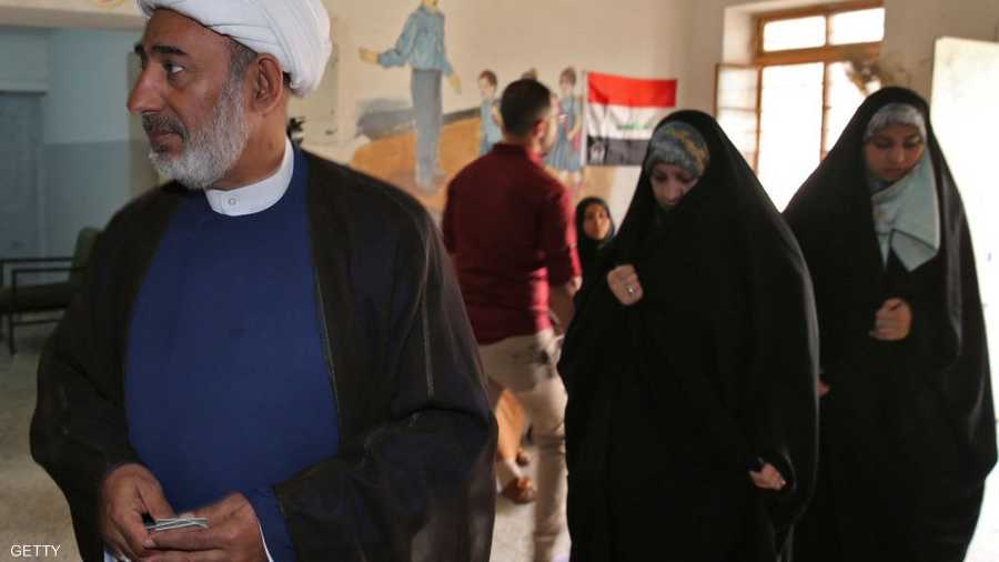 رجل دين قام بالتصويت في منطقة الكرادة ببغداد