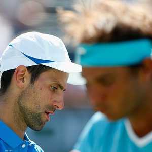 جوكوفيتش (يسار) ونادال قطبا ملاعب التنس العالمية