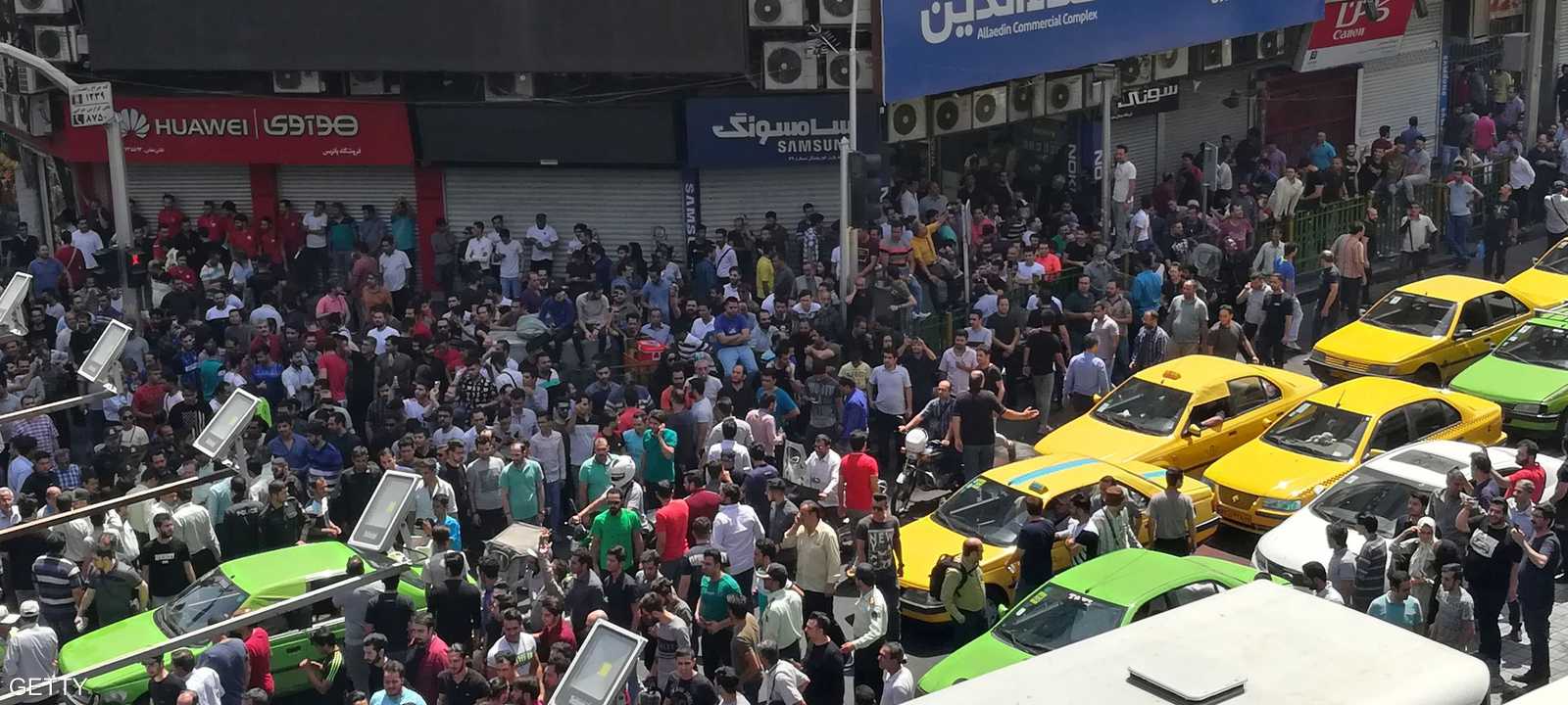 إحدى مظاهرات الاحتجاج في طهران على تدهور العملة المحلية.