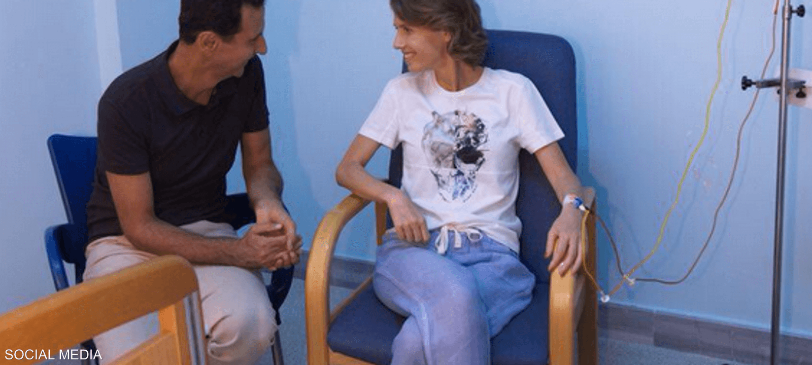 الرئيس السوري إلى جانب زوجته - صورة أرشيفية