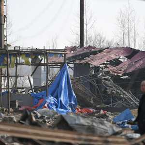 آثار الدمار الذي لحق بالمنطقة بعد الحريق بالمصنع