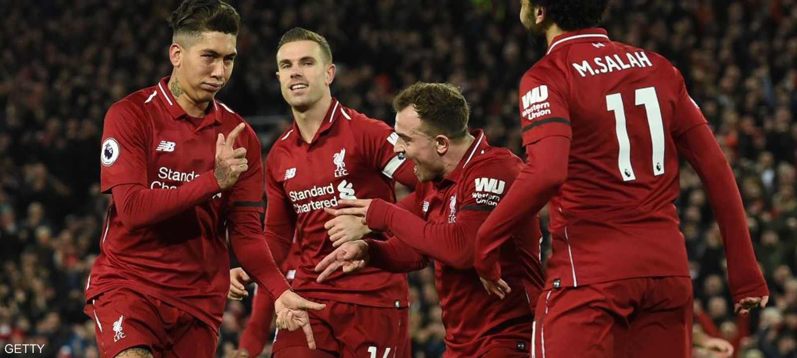 لاعبو ليفربول يحتفلون بالانتصار العريض