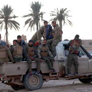 عناصر من قوات سوريا الديمقراطية في منطقة هجين السورية