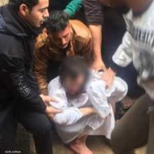 الشاب بعد إنقاذه من قبل الأجهزة المختصة.