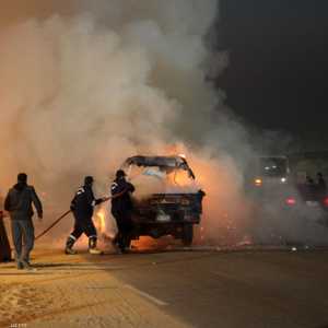 أرشيفية لسيارة أمن محترقة في القاهرة