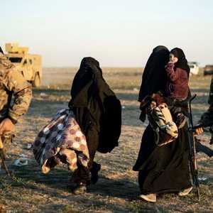 الزوجة هربت بطفليها من فلوريدا إلى سوريا.