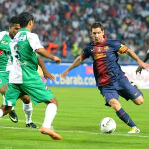 ميسي في مباراة ودية أمام الرجاء البيضاوي المغربي عام 2012