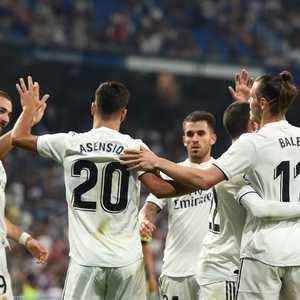 النجم الإسباني أسينسيو ولاعبو الملكي