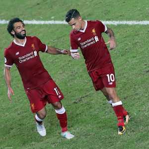 صلاح وكوتينيو