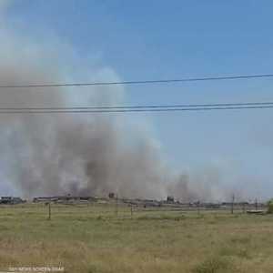 النيران ناجمة عن حرق مخلفات المحاصيل في الحقول.