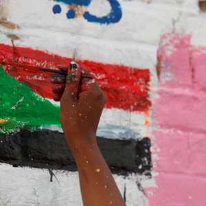 جدارية لإحدى المشاركات في اعتصام الخرطوم