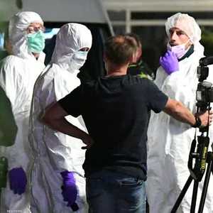 فريق من الطب الشرعي في مكان الحادثة