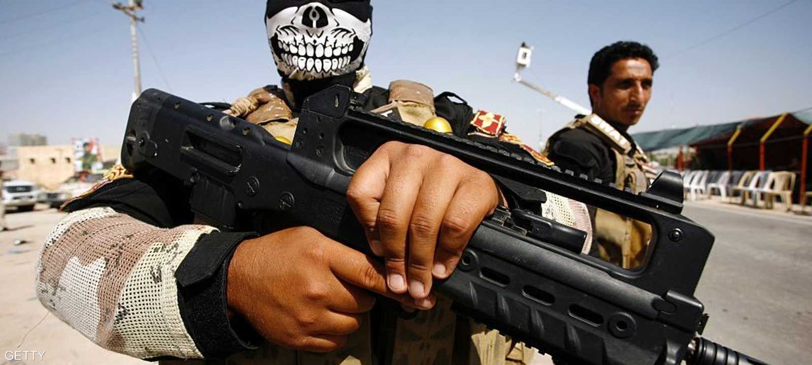 أعضاء بالحشد الشعبي في مدينة النجف. أرشيف