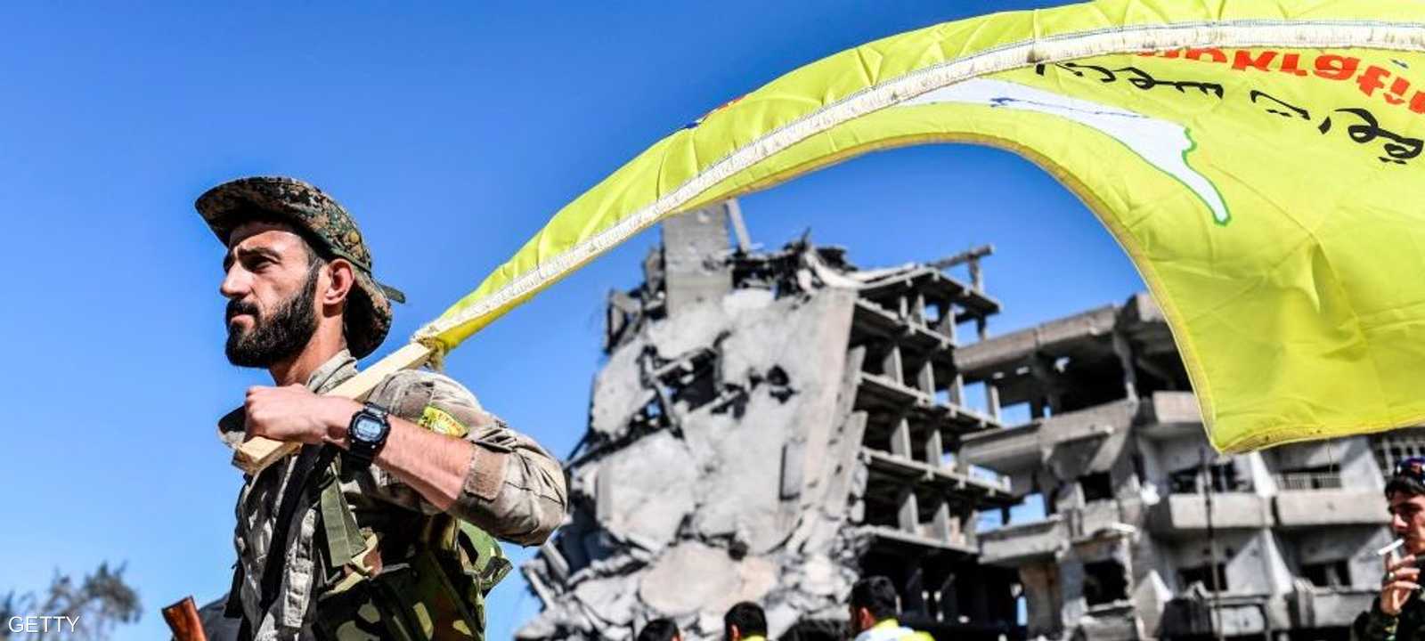 عناصر من "سوريا الديمقراطية" في الرقة - أرشيفية