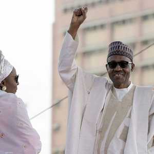 الرئيس بخاري وزوجته عائشة في لقطة أرشيفية