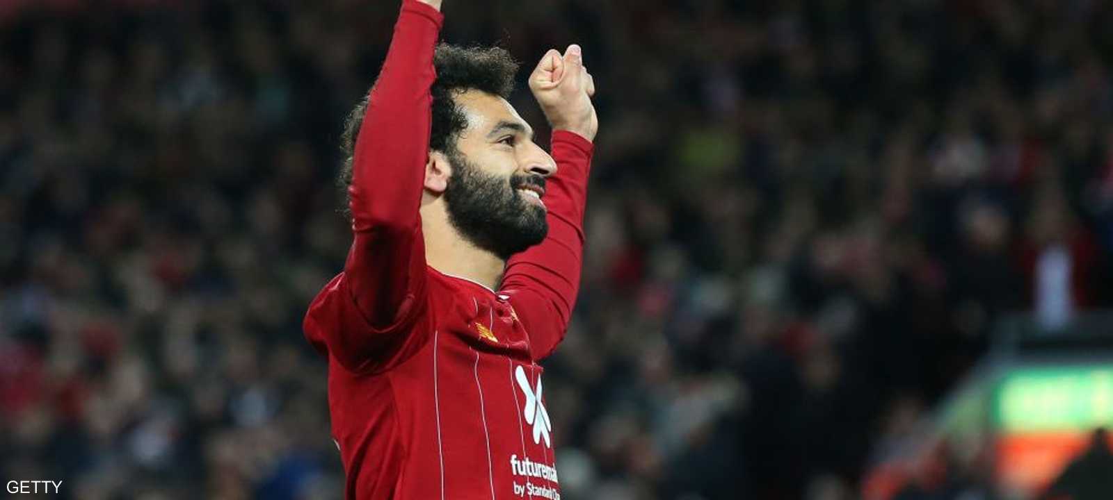 صلاح يحتفل بهدفه في توتنهام