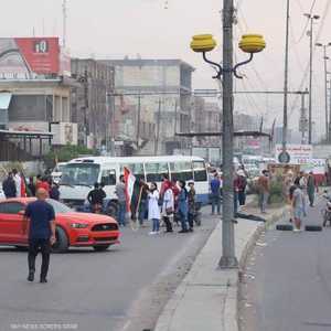 المتظاهرون قطعا طرقا رئيسية في بغداد