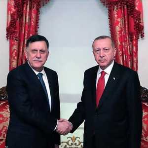 أردوغان والسراج في لقاء سابق العام الماضي