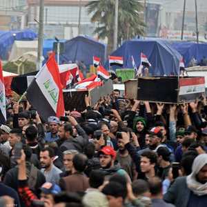 تشييع سكان محافظة النجف العراقية ضحايا أحداث الخميس