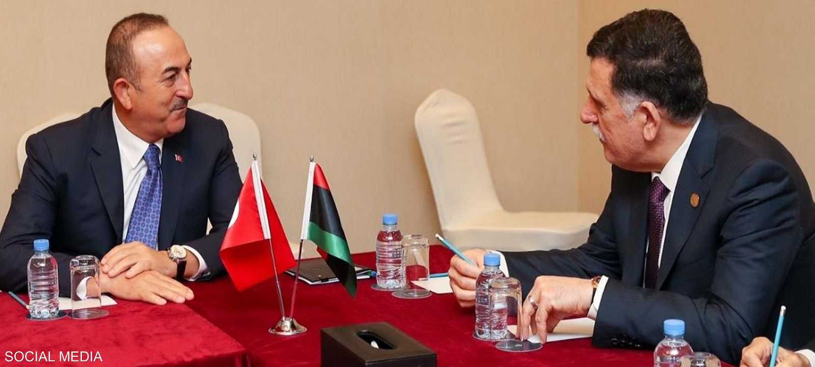 السراج مع وزير الخارجية التركي