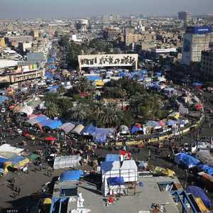 متظاهرون عراقيون في ساحة التحرير ببعداد