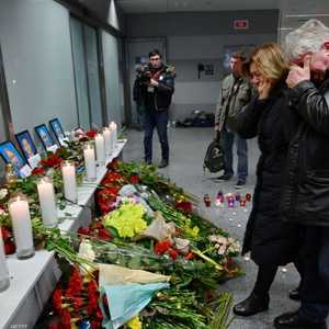 أوكرانيون يبكون على أقاربهم الذين قضوا في كارثة الطائرة