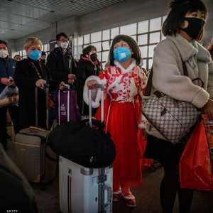 مجموعة من المسافرين في مطار بكين