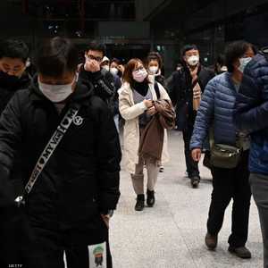 مسافرون في مطار بكين الدولي