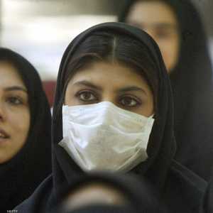 فتاة إيرانية ترتدي كمامة طبية (أرشيف)