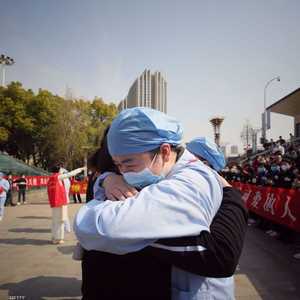 خلال مراسم رحيل فريق طبي بعد إتمام مهمته في ووهان