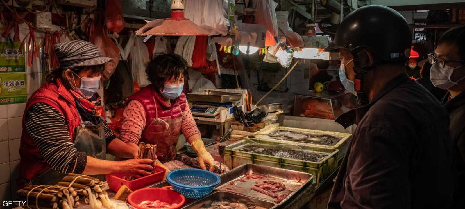 سوق المأكولات الحية يعاود نشاطه بشروط في ووهان