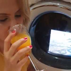 دينا بطي أنجزت فيديو السفر أمام غسالتها