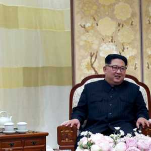 كيم جونغ أون مع زوجته ري سول جو