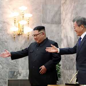 كيم جونغ أون ورئيس كوريا الجنوبية في وقت سابق