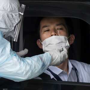 أرشيفية.. شاب ياباني يخضع لاختبار كورونا