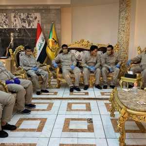 أعضاء ميليشيا حزب الله العراقي بعد الإفراج عنهم