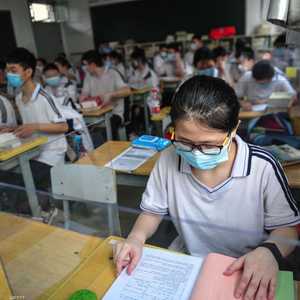 التلاميذ في إحدى مدارس ووهان حيث ظهر فيروس كورونا