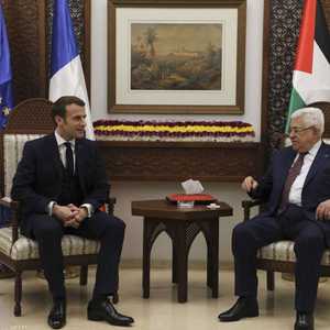 جانب من لقاء سابق بين عباس وماكرون