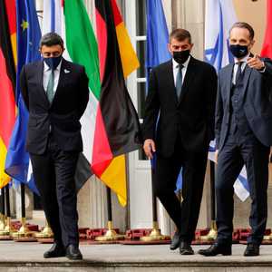 جانب من اللقاء الثلاثي في برلين.